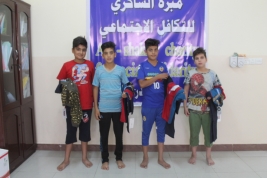 بغداد - فرع مدينة الصدر : تسليم كسوة  العيد للاطفال