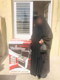 فرع مدينة الصدر : ارملة وابنائها يحصلون على تبرع من التبرعات العامة خارج العراق .